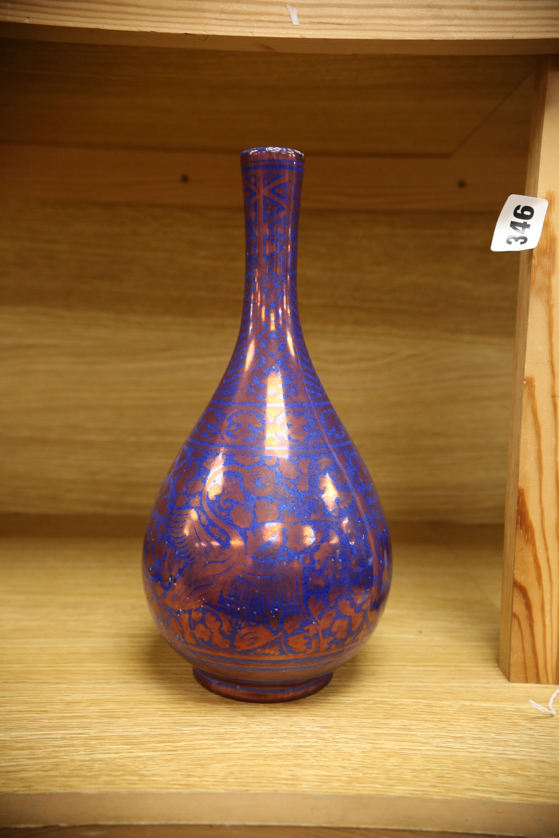 A Gallo, Italy copper lustre bottle vase, copy of a Safavid design, 27cm. Condition - good